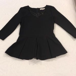 Black peplum beaded top